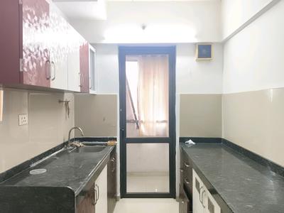 Kitchen Image of 729 Sq.ft 1 BHK Apartment / Flat for rent in Lodha Palava Downtown, Palava Phase 2 Thane for Rs. 13000
