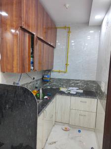 Kitchen Image of 400 Sq.ft 2 BHK Builder Floor for rent in Sector 17 Rohini New Delhi for Rs. 19000