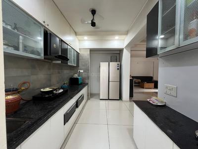 Kitchen Image of 1800 Sq.ft 3 BHK Apartment / Flat for sale in Orchid Heaven, Shela Ahmedabad for Rs. 12500000