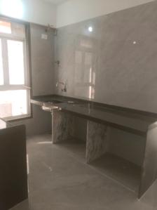 Kitchen Image of 651 Sq.ft 2 BHK Apartment / Flat for sale in Digam Poonam CHSL, Borivali East Mumbai for Rs. 17950000