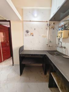 Kitchen Image of 650 Sq.ft 1 BHK Apartment / Flat for rent in Pimple Gurav Pune for Rs. 17000