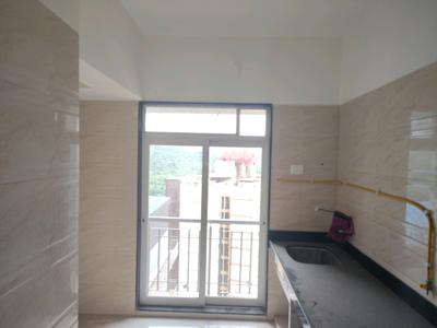 Kitchen Image of 700 Sq.ft 1 BHK Apartment / Flat for rent in Puraniks Rumah Bali, Kasarvadavali Thane for Rs. 17500