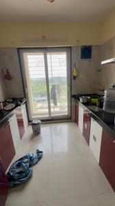Kitchen Image of 550 Sq.ft 1 BHK Apartment / Flat for rent in Arihant Aarohi, Shilgaon Thane for Rs. 15000