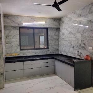Kitchen Image of 1750 Sq.ft 3 BHK Apartment / Flat for sale in Sai Parisar, Palanpur Surat for Rs. 8191000