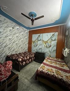 Bedroom Image of Shri ji P.G in Shahdara, New Delhi