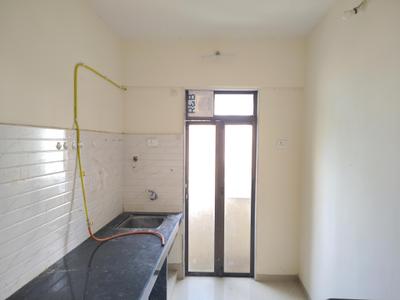 Kitchen Image of 675 Sq.ft 1 BHK Apartment / Flat for rent in Raunak Heights H2 And H3, Kasarvadavali Thane for Rs. 16000