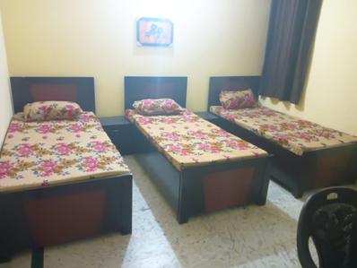 Bedroom Image of Chitra Girls and Boys PG in Sector 41, Noida