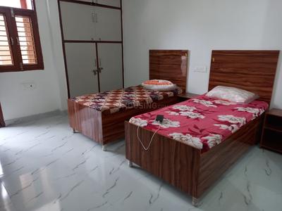 Bedroom Image of Mannat PG Home in Sector 142, Noida