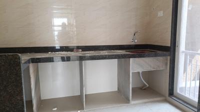 Kitchen Image of 981 Sq.ft 2 BHK Apartment / Flat for sale in Bhagwati Belmont, Kasarvadavali Thane for Rs. 9199000