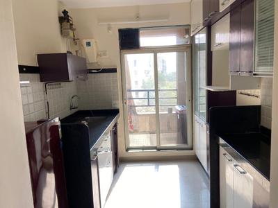 Kitchen Image of 915 Sq.ft 2 BHK Apartment / Flat for rent in DSS Mahavir Kalpavruksha, Kasarvadavali Thane for Rs. 35000