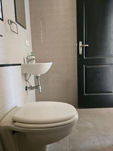 Common Bathroom Image of 1100 Sq.ft 2 BHK Apartment / Flat for sale in Nyati Elan, Wagholi Pune for Rs. 7600000