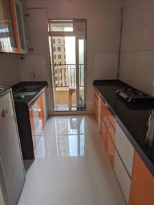 Kitchen Image of 850 Sq.ft 2 BHK Apartment / Flat for rent in Rustomjee Azziano, Thane West Thane for Rs. 50000