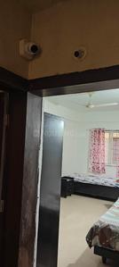 Bedroom Image of Om Sai PG in Ghorpadi, Pune