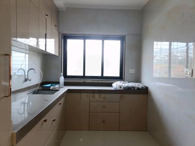 Kitchen Image of 850 Sq.ft 2 BHK Apartment / Flat for rent in Rashi Tower, Goregaon East Mumbai for Rs. 60000
