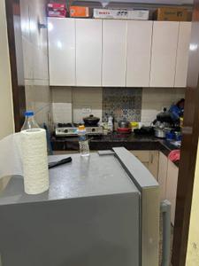 Kitchen Image of 501 Sq.ft 1 BHK Builder Floor for rent in Old Double Storey, Lajpat Nagar New Delhi for Rs. 25000