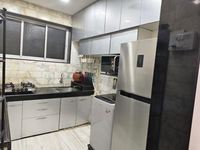 Kitchen Image of 950 Sq.ft 2.5 BHK Apartment / Flat for sale in Nityanand Baug CHS, Chembur Mumbai for Rs. 27500000