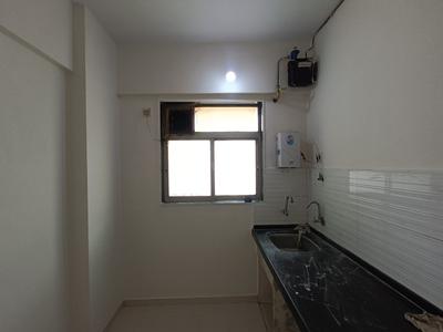 Kitchen Image of 680 Sq.ft 1 BHK Apartment / Flat for sale in Kasarvadavali Thane for Rs. 5400000