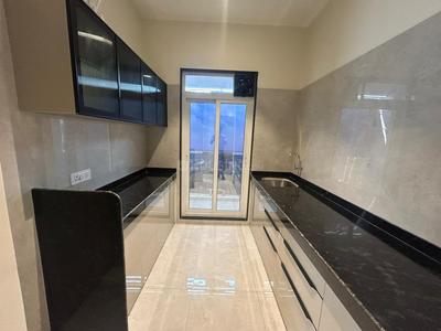 Kitchen Image of 678 Sq.ft 1 BHK Apartment / Flat for sale in Gajra Bhoomi Castle Phase I, Daighar Gaon Thane for Rs. 4700000
