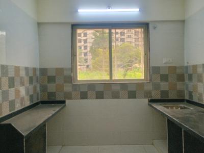 Kitchen Image of 675 Sq.ft 1 BHK Apartment / Flat for sale in Mohan Nano Estates, Ambernath West Ambernath for Rs. 2500000