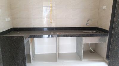 Kitchen Image of 1090 Sq.ft 2 BHK Apartment / Flat for sale in Bhagwati Belmont, Kasarvadavali Thane for Rs. 9900000