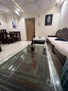 Living Room Image of 850 Sq.ft 1 BHK Apartment / Flat for rent in Althan Surat for Rs. 24000
