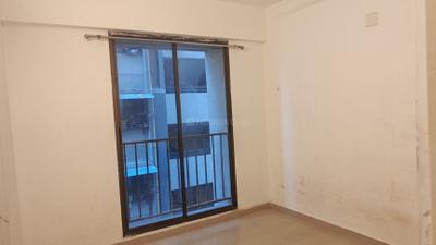 Bedroom Image of 646 Sq.ft 1 BHK Apartment / Flat for rent in Applewoods Satyesh Residency, Shela Ahmedabad for Rs. 14000
