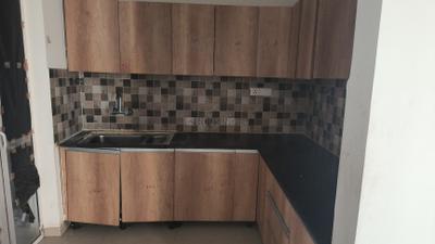 Kitchen Image of 969 Sq.ft 2 BHK Apartment / Flat for rent in Prateek Grand City, Siddharth Vihar Ghaziabad for Rs. 24000