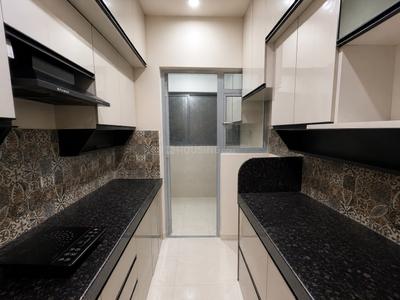 Kitchen Image of 910 Sq.ft 2 BHK Apartment / Flat for sale in Rohan Abhilasha, Wagholi Pune for Rs. 7500000
