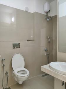 Common Bathroom Image of 900 Sq.ft 1 BHK Apartment / Flat for sale in Unique Vistas, Thane West Thane for Rs. 9600000