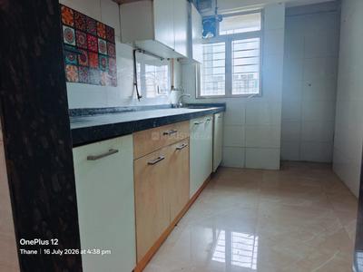 Kitchen Image of 700 Sq.ft 2 BHK Apartment / Flat for rent in Lodha Amara, Kolshet Thane for Rs. 34000