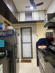 Kitchen Image of 672 Sq.ft 2 BHK Apartment / Flat for sale in Dharmesh Om Sai Tower, Dahisar West Mumbai for Rs. 13500000