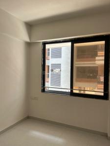 Bedroom Image of 1215 Sq.ft 2 BHK Apartment / Flat for sale in RJ Sanskruti Heights, Lambha Ahmedabad for Rs. 3400000