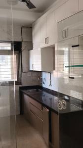 Kitchen Image of 1111 Sq.ft 3 BHK Apartment / Flat for sale in Chandak Ideal Chsl, Juhu Mumbai for Rs. 55000000