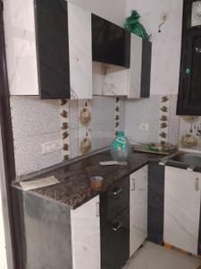 Kitchen Image of 500 Sq.ft 1 BHK Builder Floor for rent in Sector 62A Noida for Rs. 16000