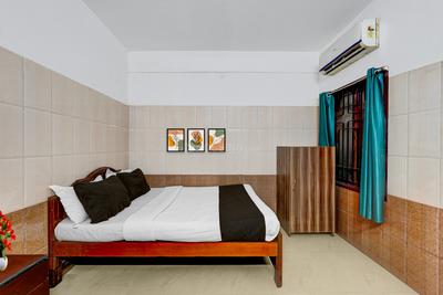 Bedroom Image of VARSHA RESIDENCY in MG Road Area, Puducherry
