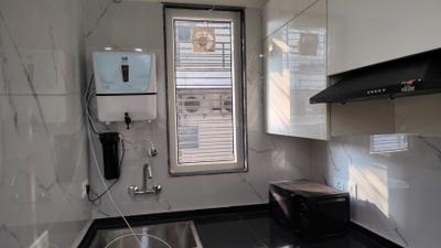 Kitchen Image of 1100 Sq.ft 1 BHK Builder Floor for rent in Sector 46 Gurgaon for Rs. 42000