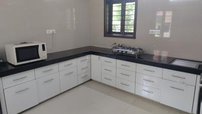Kitchen Image of 15000 Sq.ft 4 BHK Villa for rent in Navratna Kalhaar Blues And Greens, Sanand Ahmedabad for Rs. 180001