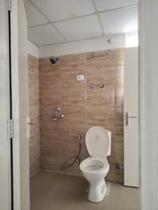 Common Bathroom Image of 990 Sq.ft 2 BHK Apartment / Flat for sale in Ajnara Le Garden, Noida Extension Greater Noida for Rs. 7800000