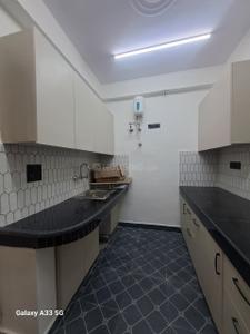 Kitchen Image of 1045 Sq.ft 2 BHK Apartment / Flat for sale in Mittal Cosmos Executive Apartment, Palam Vihar Gurgaon for Rs. 12000000
