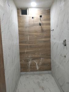 Common Bathroom Image of 635 Sq.ft 2 BHK Builder Floor for sale in Mahavir Enclave New Delhi for Rs. 6500000
