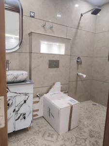 Common Bathroom Image of 1100 Sq.ft 3 BHK Apartment / Flat for rent in Rajpur Khurd Village New Delhi for Rs. 33000
