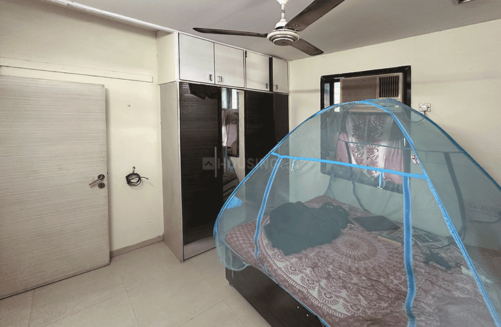 Bedroom Image of Daxini Nest in Mulund East, Mumbai