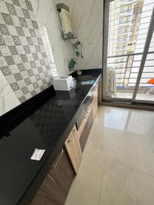 Kitchen Image of 600 Sq.ft 1 BHK Apartment / Flat for rent in Bhoomi Lawns Phase II, Shilgaon Thane for Rs. 18000