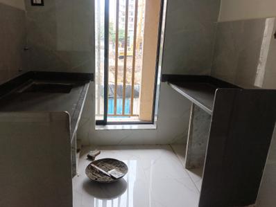 Kitchen Image of 700 Sq.ft 2 BHK Apartment / Flat for sale in Shalibhadra Yash, Nalasopara West Nala Sopara for Rs. 4100000