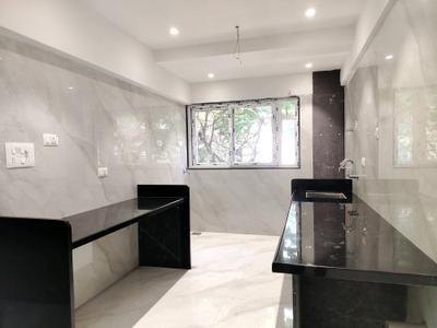 Kitchen Image of 1600 Sq.ft 3 BHK Apartment / Flat for sale in Yoo One Phase I, Mohammed Wadi Pune for Rs. 22500000