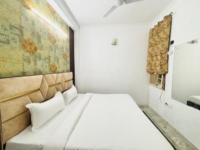 Bedroom Image of Apna Niwas Boys Pg in Sector 16A, Noida