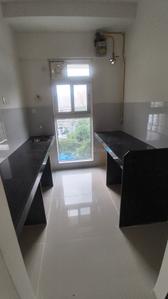 Kitchen Image of 700 Sq.ft 1 BHK Apartment / Flat for rent in Ashar Arize, Kalwa Thane for Rs. 27000