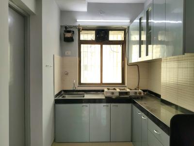 Kitchen Image of 981 Sq.ft 2 BHK Apartment / Flat for sale in Nirmal City Of Joy, Mulund West Mumbai for Rs. 18500000