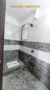Bathroom Image of 950 Sq.ft 2 BHK Apartment / Flat for rent in Tirupati Eternia, Charholi Budruk Pune for Rs. 14000