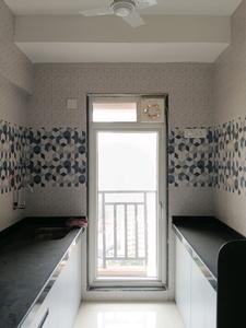 Kitchen Image of 450 Sq.ft 1 BHK Apartment / Flat for rent in Raunak Bliss, Kasarvadavali Thane for Rs. 27000
